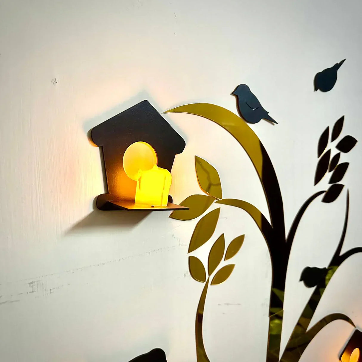 Close-Up of Acrylic Birds on Tree Silhouette Design