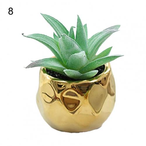 Set of 2 realistic indoor artificial succulent plants in mini ceramic pots.