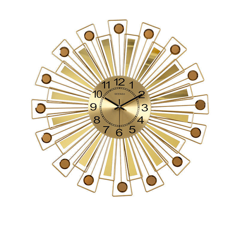 Close-up of the silent analog display on the golden wall clock

