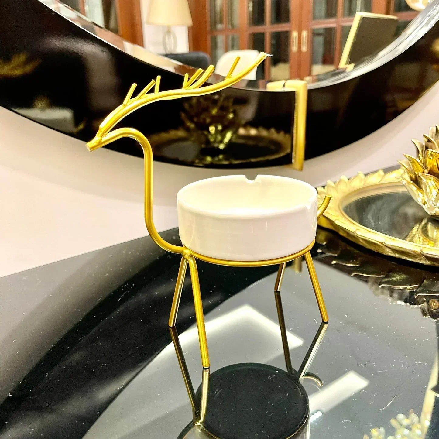 ashtray decor in gold tone