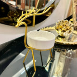 ashtray with a shiny gold finish