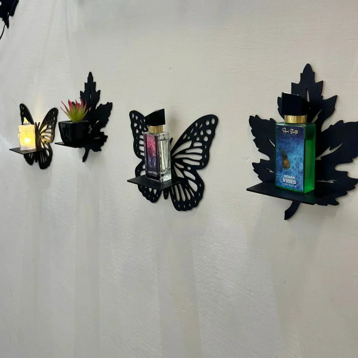 wooden shelf with swan motif and leaf