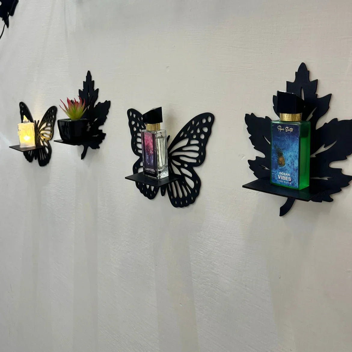 wooden shelf with swan motif and leaf